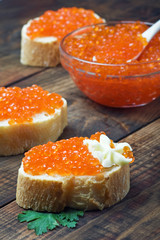 red caviar on slices of baguette