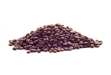 a handful of hot roasted coffee beans isolated on white