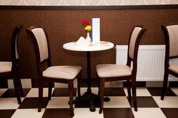 Table and chairs in cafe