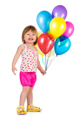 Fototapeta na wymiar Little girl smiling with balloons.