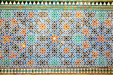 Naklejka premium Tiled oriental mosaic wall in the Royal Alcazars of Seville, Spa