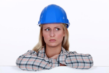 portrait of worried handywoman