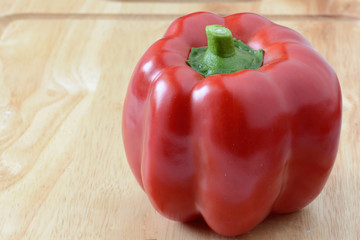 Sweet pepper on wood