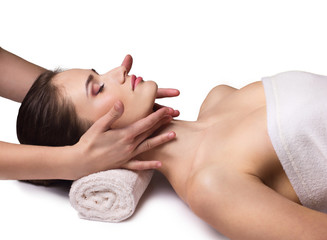 Obraz na płótnie Canvas facial massage for young woman