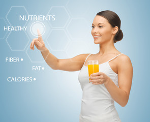 woman with glass of juice and virtual screen