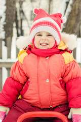  little girl in a red jacket