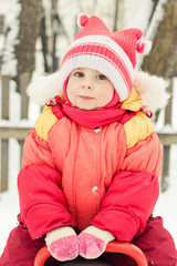  little girl in a red jacket