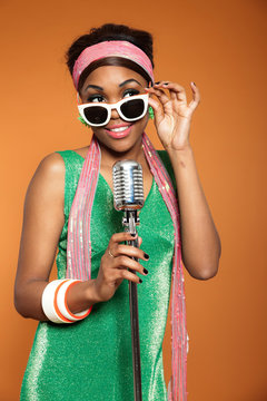 Vintage soul funk woman singing. Black african american.