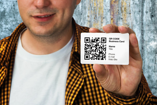 Construction worker with QR code business card - Powered by Adobe