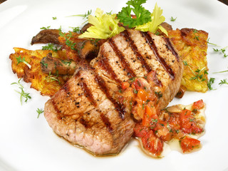 Kalbssteak mit Rösti und Pilze