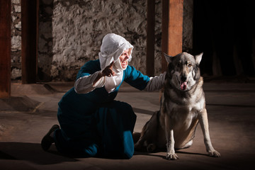 Nun Talking to Dog