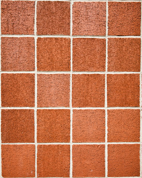 Square brick wall.