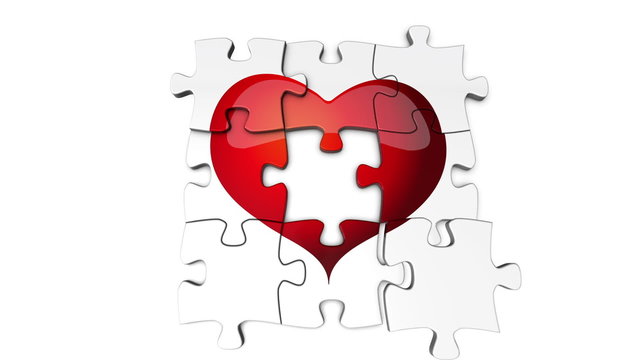 Puzzle pieces getting put together to reveal a heart