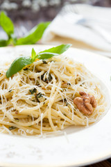 Spaghetti with spinach and peanut sauce