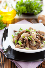 mushroom salad in a white bowl, honey