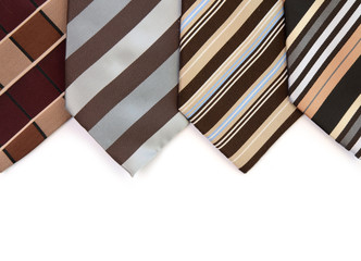 Different neckties on white