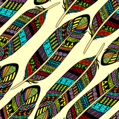 Vector seamless pattern with etno ornate colorful feathers