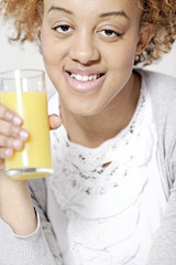 black woman drinking juice