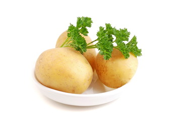 Raw potatoes with parsley