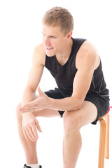 a young sporty man on white background