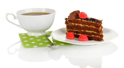 A cup of tea and delicious cake isolated on white