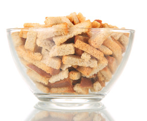 Crackers in glass bowl, isolated on white