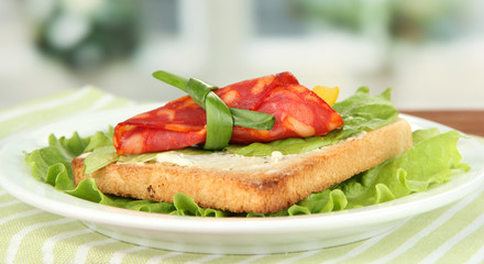 Salami rolls with paprika pieces inside,