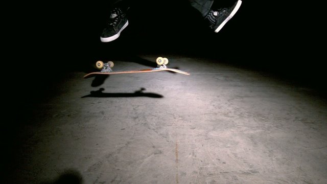 Skater doing double kickflip trick