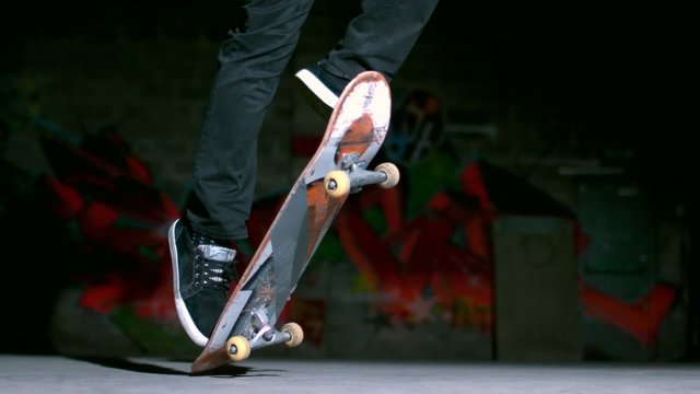 Skater performing impossible 360 trick