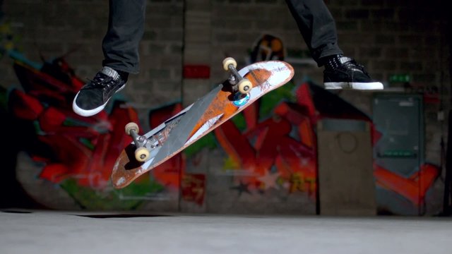 Close up of skater doing double flip trick