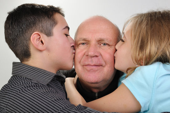 family portrait of elderly father with children