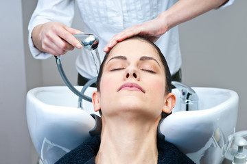 attractive woman washing her hair