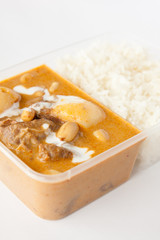 Thai take away food, massaman curry with rice