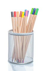 Coloured pencils in a desk tidy