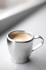 Espresso pouring into a cup