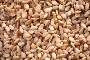 Deurstickers Pile of white sesame grains © raimunda-losantos