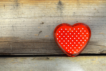 red heart on an old wooden fence