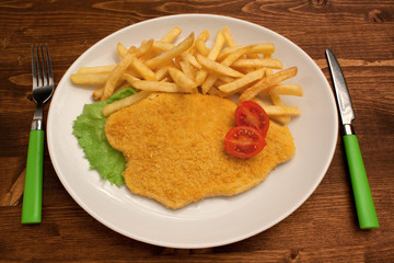 Cotoletta e patatine fritte