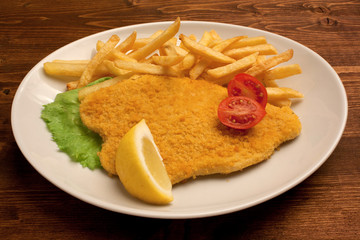 Cotoletta e patatine fritte