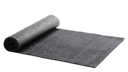 Artificial rolled black grass isolated on white