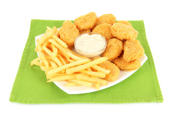 Fried chicken nuggets with french fries and sauce isolated