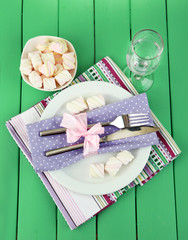Table setting in violet and white tones
