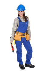 Female Worker Holding Wrench And Toolbox