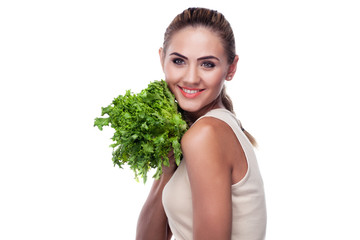 woman with bundle herbs (salad). Concept vegetarian dieting - he