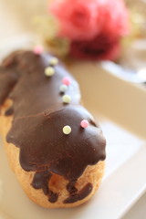 french confectionery, eclari with chocolate and decoration sugar