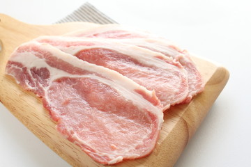 freshness slided pork on wooden chopping board