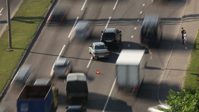 Cars in collision accident on road. Timelapse.
