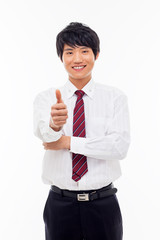 Showing thumb young Asian business man.