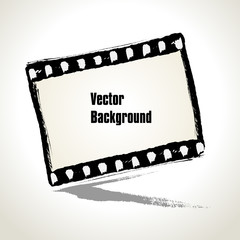 Vector: Aged  illustration of a grunge filmstrip frame.
