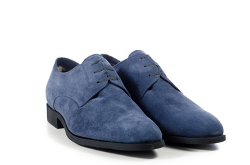 everyday pair of blue men's shoes on a white background